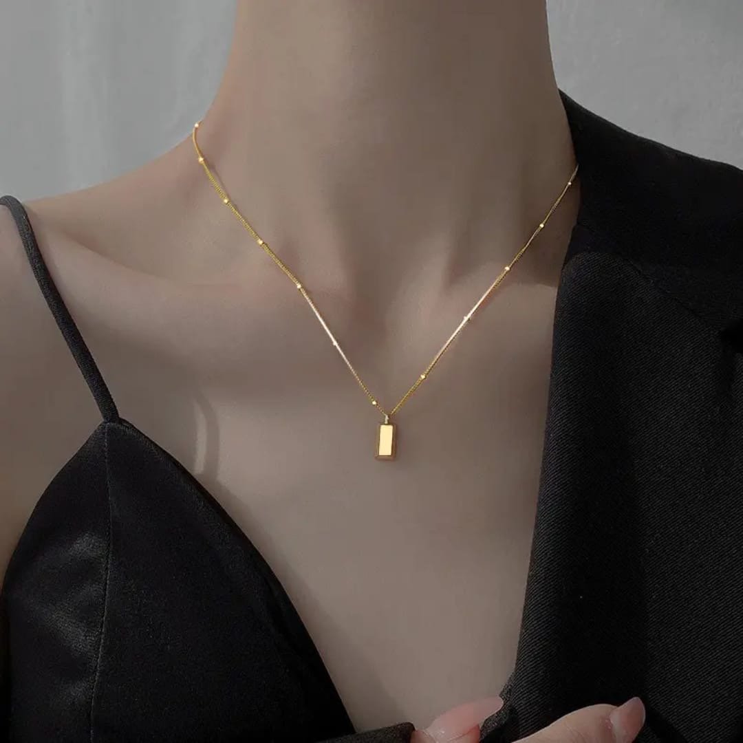 5853405d-3a2f-4256-94da-3f40b8d3d417 The Laxmi Mini Bar Necklace - Image 1